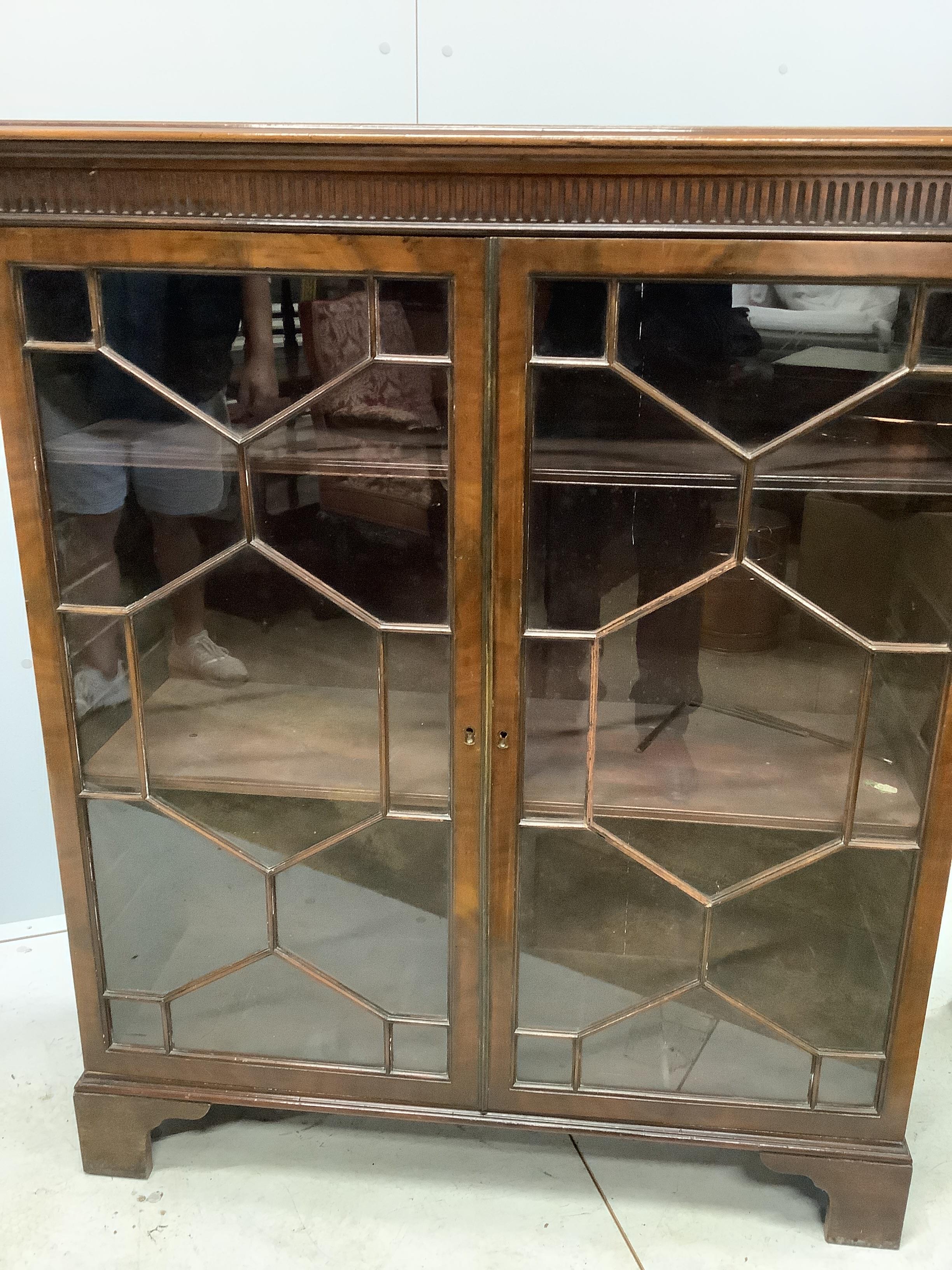 A pair of Chippendale Revival mahogany dwarf bookcases, each 97cm, depth 34cm, height 119cm